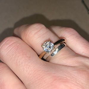 Stunning cubic zirconia engagement style ring. Adjustable!